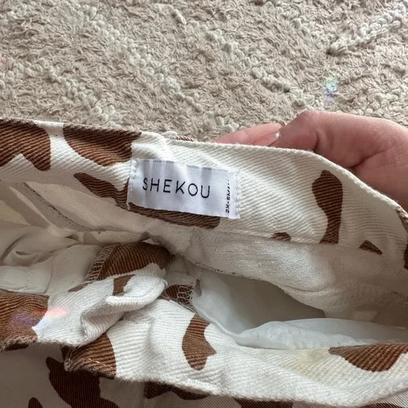 SHEKOU Brown and Cream Cow Print Jeans - Picture 3 of 4